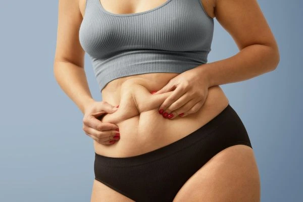 Tummy Tuck Surgery: Loose Skin vs Fat – What It Corrects